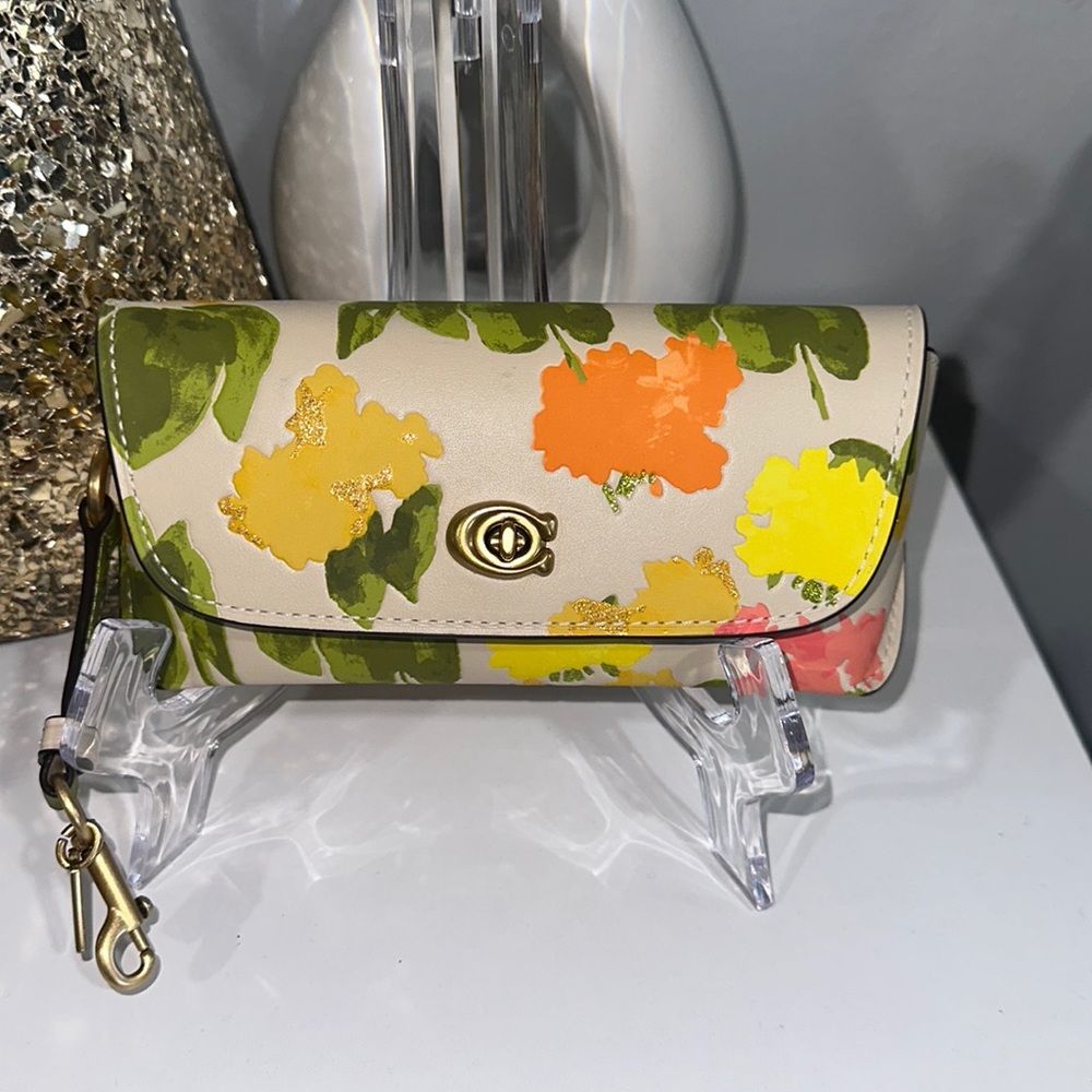 Coach sunglass bag charm with floral print